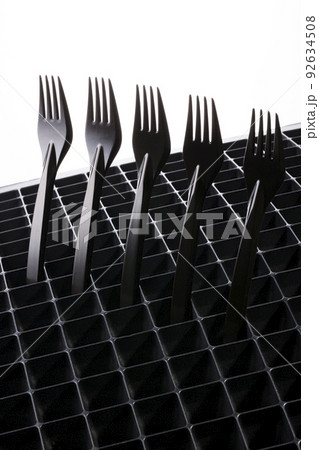 Abstract still life with sticking out black forks Abstract still life with sticking out black forks 92634508