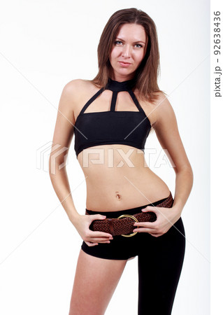 Pretty sexy girl full length posing in a nice black dress isolated over white background, series photo 92638436