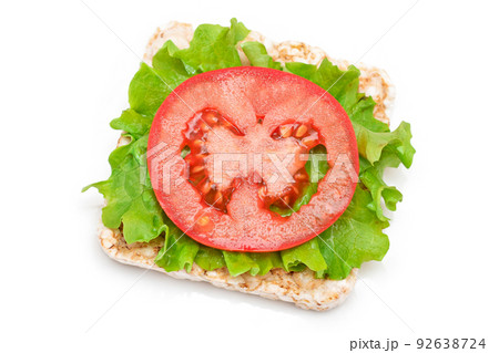 Rice Cake Sandwich with Tomato and Lettuce - Isolated Rice Cake Sandwich with Tomato and Lettuce - Isolated 92638724