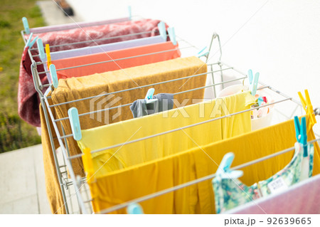 fresh clean white sheet drying on washing line in outdoor fresh clean white sheet drying on washing line in outdoor 92639665
