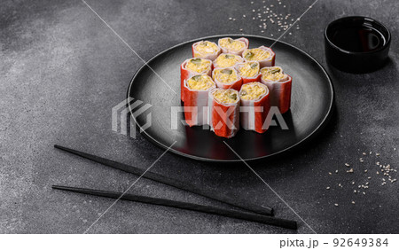 Crab sticks stuffed with rice, egg and green onions 92649384