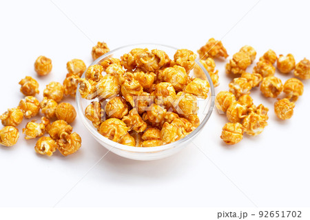 Honey caramel popcorn on white background. 92651702