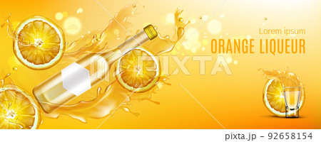 Orange liqueur bottle, shot glass and fruit slices 92658154