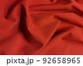 Red galliano fabric crumpled or wavy fabric texture background. Abstract linen cloth soft waves. Viscose yarn. Smooth elegant luxury cloth texture. Concept for banner or advertisement. 92658965