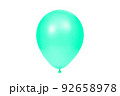 Green balloon isolated on white background. Template for postcard, banner, poster, web design. Festive decoration for celebrations and birthday. High resolution photo. 92658978