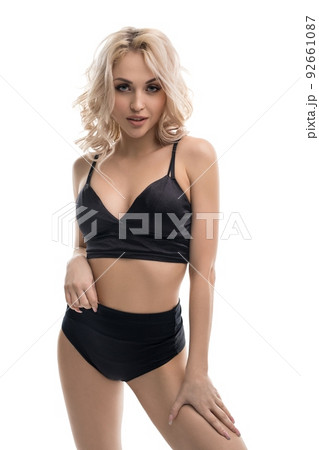 Seductive woman in black underwear in studio Seductive woman in black underwear in studio 92661087