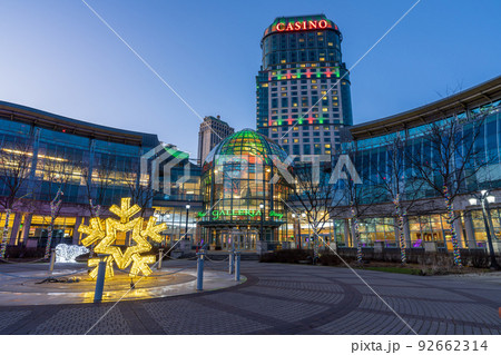 Niagara Falls, Ontario, Canada - December 19 2021 : Fallsview Square Trail, Fallsview Casino Resort in twilight time. Niagara Falls, Ontario, Canada - December 19 2021 : Fallsview Square Trail, Fallsview Casino Resort in twilight time. 92662314