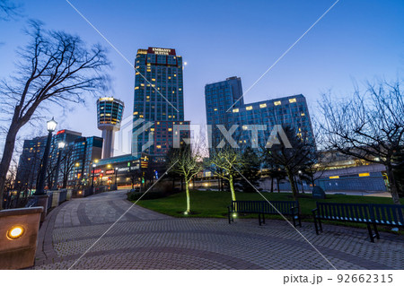 Niagara Falls, Ontario, Canada - December 19 2021 : Fallsview Square Trail, Embassy Suites by Hilton Niagara Falls Fallsview in twilight time.  92662315