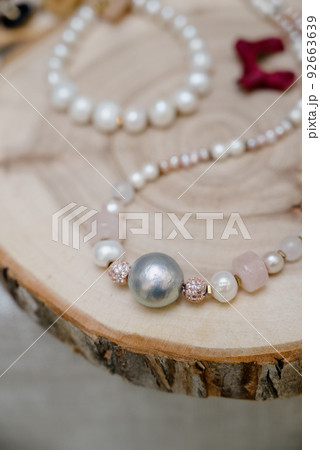 Shop window with necklaces and jewelry. Custome jewelry on display 92663639