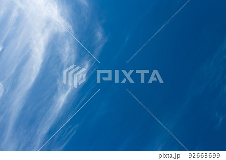 Beautiful blue sky with unusual white clouds. 92663699