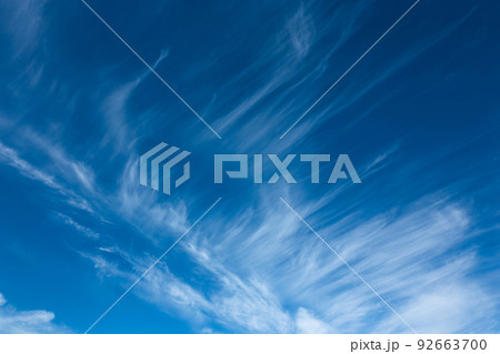 Beautiful blue sky with unusual white clouds. 92663700