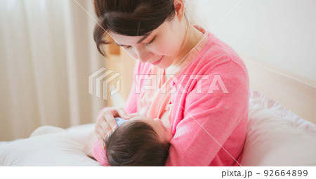 asian mother breastfeeding baby asian mother breastfeeding baby 92664899