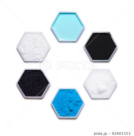 Chemical ingredient in hexagonal molecular shaped container. Hair Conditioner, Carbon Charcoal Powder, Sodium Hydroxide Pellets, Copper (II) Sulfate, Potassium permanganate and Urea. 92665353