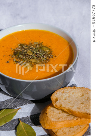 Homemade carrot ginger curcuma soup. Seasonal Pumpkin traditional soup with creamy silky texture. Healthy vegan clean eating. Seasonal spicy fall vegetables creamy pumpkin and carrot soup Homemade carrot ginger curcuma soup. Seasonal Pumpkin traditional soup with creamy silky texture. Healthy vegan clean eating. Seasonal spicy fall vegetables creamy pumpkin and carrot soup 92667778