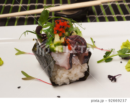 gunkan with octopus, cucumber and tobiko caviar gunkan with octopus, cucumber and tobiko caviar 92669237