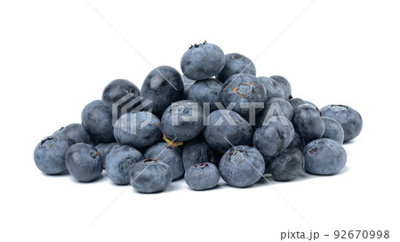 A bunch of ripe blueberries on a white isolated background A bunch of ripe blueberries on a white isolated background 92670998