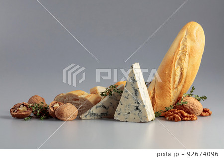 Blue cheese with baguette, walnuts, and thyme. Blue cheese with baguette, walnuts, and thyme. 92674096