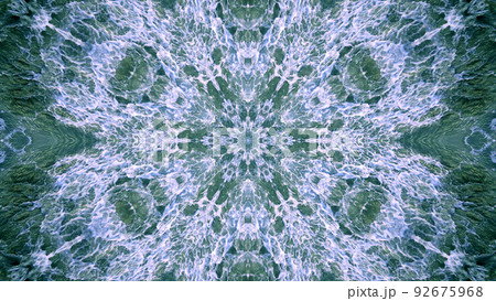 Kaleidoscopic sea waves background. Ocean colors design. Disco mandala spectrum lights concert spot Kaleidoscopic sea waves background. Ocean colors design. Disco mandala spectrum lights concert spot 92675968