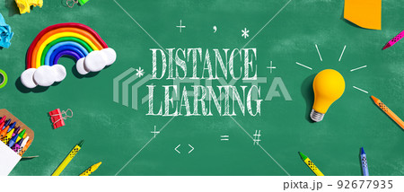 Distance Learning theme with school supplies - flat lay Distance Learning theme with school supplies - flat lay 92677935