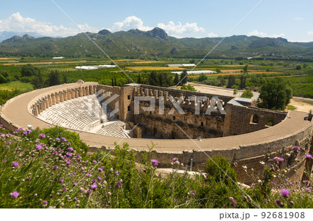 Well-preserved Roman theater of ancient city of Aspendos with green surroundings, Turkey Well-preserved Roman theater of ancient city of Aspendos with green surroundings, Turkey 92681908