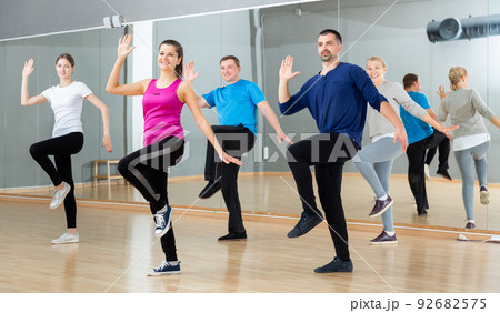Adult people training in dance studio Adult people training in dance studio 92682575