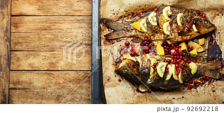 Baked carp with fruits, ,space for text 92692218