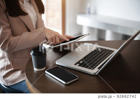 Business concepts, business people working in the work area with tablet and laptop and smartphone at the desk. 92692742