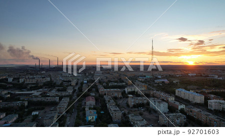 Orange sunset over small town. Top view from drone Orange sunset over small town. Top view from drone 92701603