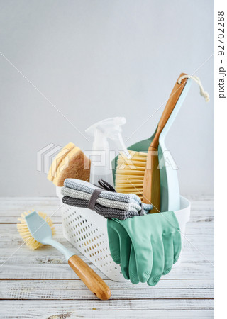Cleaning service concept. Cleaning accessories in blue color. Cleaning service concept. Cleaning accessories in blue color. 92702288