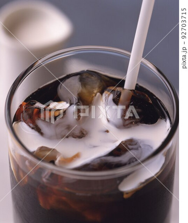 glass with cola and ice glass with cola and ice 92703715
