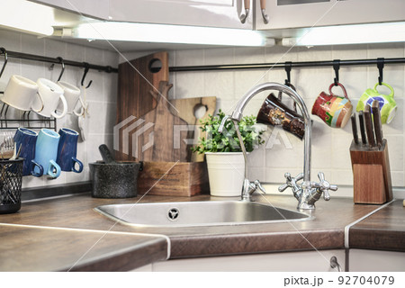 stainless steel sink and  mixer tap. 92704079