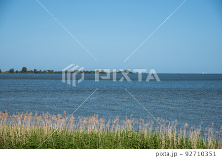 Enkhuizen, Netherlands. June 2022. View of the Markermeer near Enkhuizen. 92710351