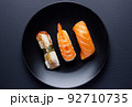 Close up of sashimi sushi set on black background. 92710735