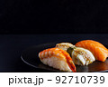 Japanese seafood on dark background. Sushi Set. 92710739