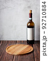 Wine bottles on wooden background. Space for text. 92710884