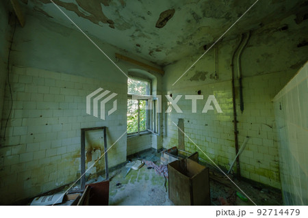 Abandoned room with broken furniture Abandoned room with broken furniture 92714479