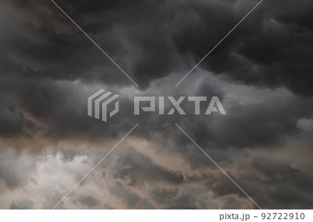 Storm cloud background before rain. Huge black clouds on sunset. 92722910