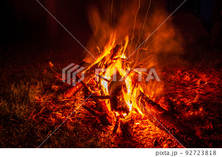 bonfire at night in the forest, sparks from a fire, Night campfire bonfire at night in the forest, sparks from a fire, Night campfire 92723818