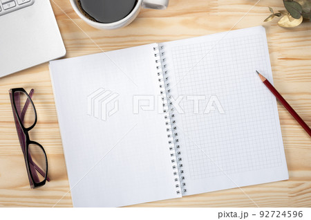 Top view workspace notepad with pencil and blank tablet screen for placing your text and design. Top view office desk mockup 92724596