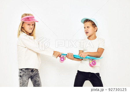 Little couple kids boy girl posing games fun lifestyle childhood Little couple kids boy girl posing games fun lifestyle childhood 92730125