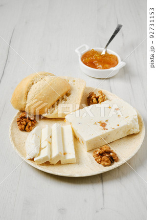 Homemade curd cheese with raisin and walnut Homemade curd cheese with raisin and walnut 92731153