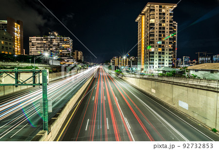 evening commute on H1 Freeway at night in honolulu hawaii 92732853