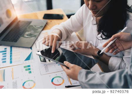 Analysis consulting for business planning, finance and investment. Young business people are discussing the marketing strategy model planning 92740376