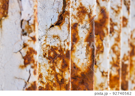 Rusty bridge railing texture background with cracked white paint 92740562