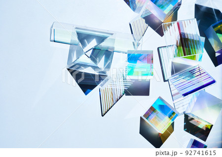 Geometric figures prisms with light diffraction of spectrum colors and reflection with trendy light Geometric figures prisms with light diffraction of spectrum colors and reflection with trendy light 92741615