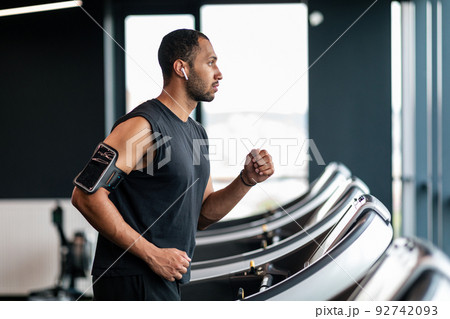 Sport Training. Motivated African American Man Using Treadmill At Gym, 92742093