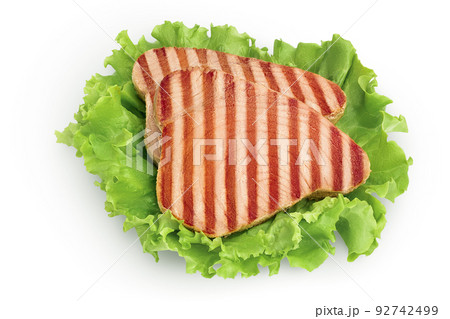 Tuna fish steak grilled isolated on white background with full depth of field. Top view. Flat lay 92742499