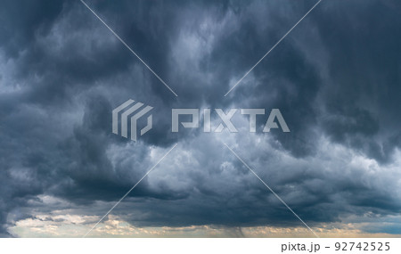 Fantastic thunderclouds at sunrise Fantastic thunderclouds at sunrise 92742525