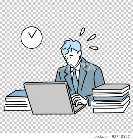 山のような仕事を抱えて残業する会社員男性 92748597