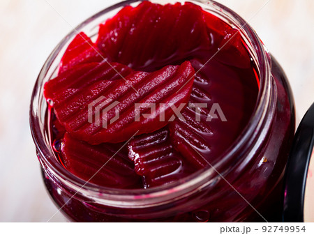 Glass jar with pickled red beets Glass jar with pickled red beets 92749954